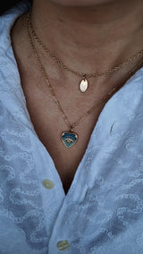 Collier cœur œil doré vert – acier inoxydable