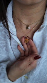Collier cœur œil doré orange – acier inoxydable