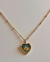 Collier cœur œil doré vert – acier inoxydable